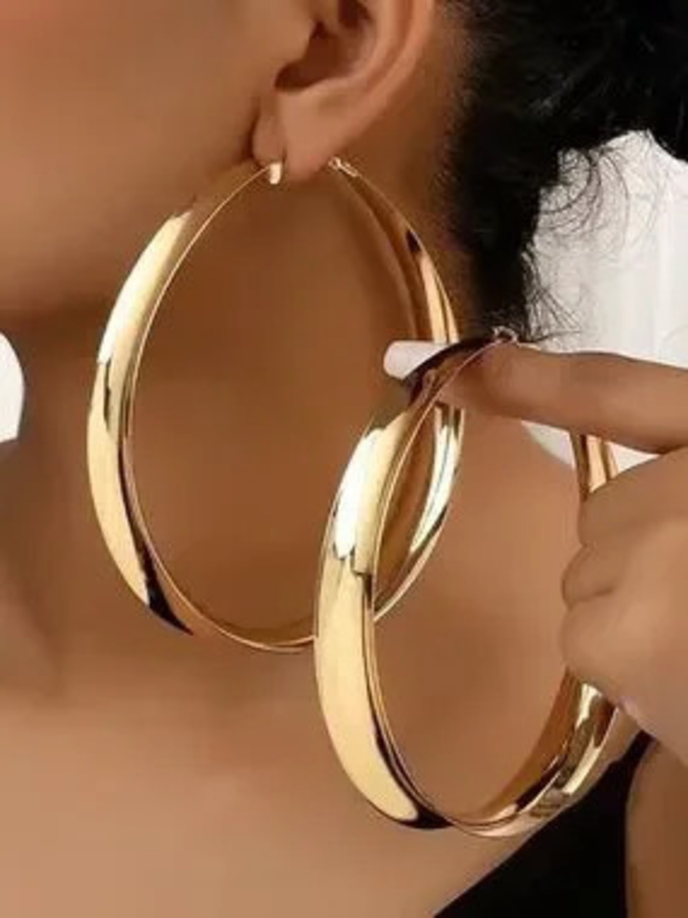 Anthropologie Shiny Gold Tone Twisted Hoop Earrings